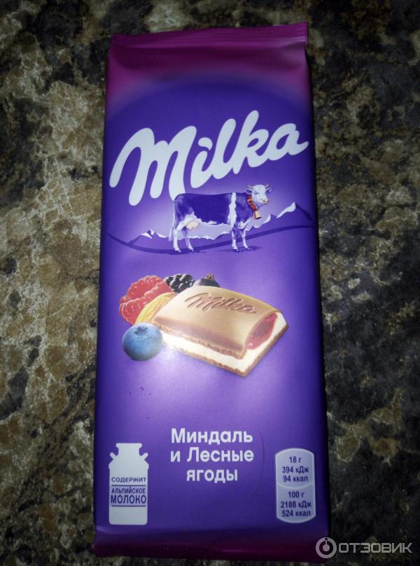 Шоколад Milka с миндалем и лесными ягодами фото