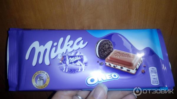 Шоколад молочный Milka Oreo с темным печеньем фото