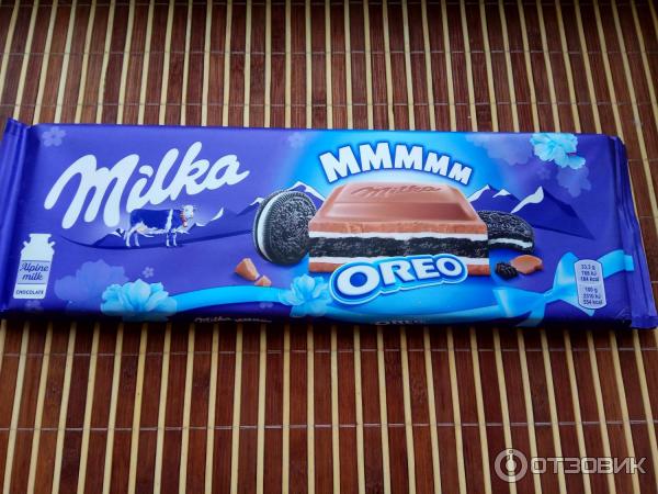 Шоколад молочный Milka Oreo с темным печеньем фото