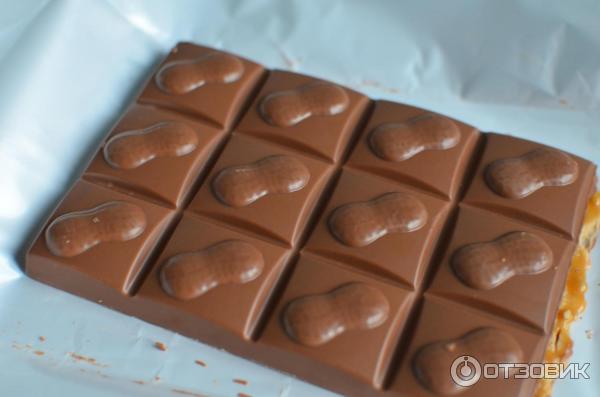 Шоколад молочный Milka Peanut caramel фото