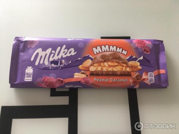 Шоколад молочный Milka Peanut & Crispy Caramel фото