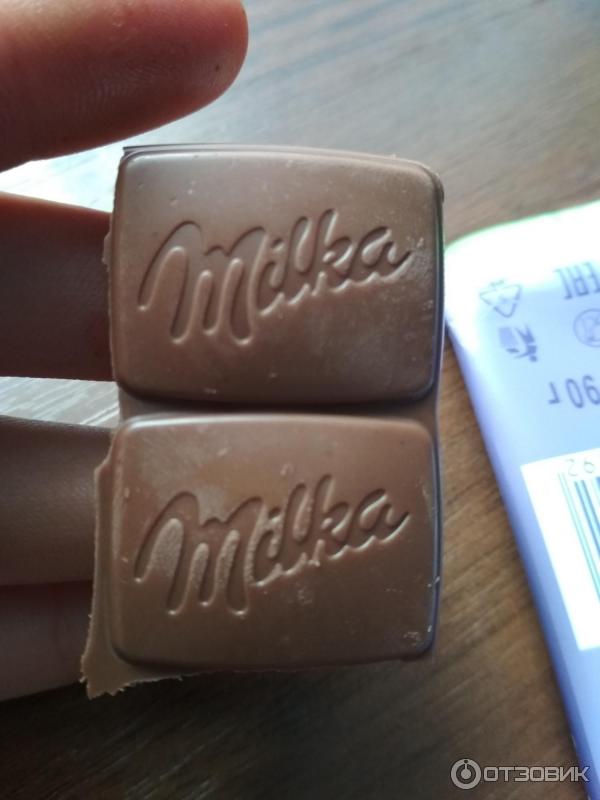 Шоколад Milka с цельным миндалем фото