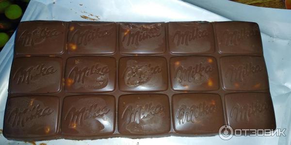 Молочный шоколад Milka с цельным лесным орехом фото