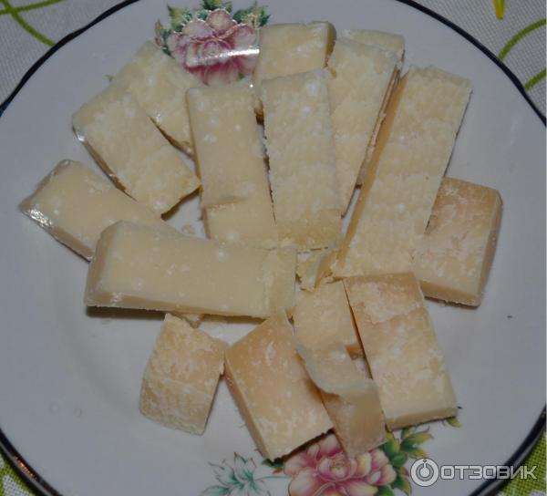 Сыр твердый Castelli Parmigiano Reggiano фото