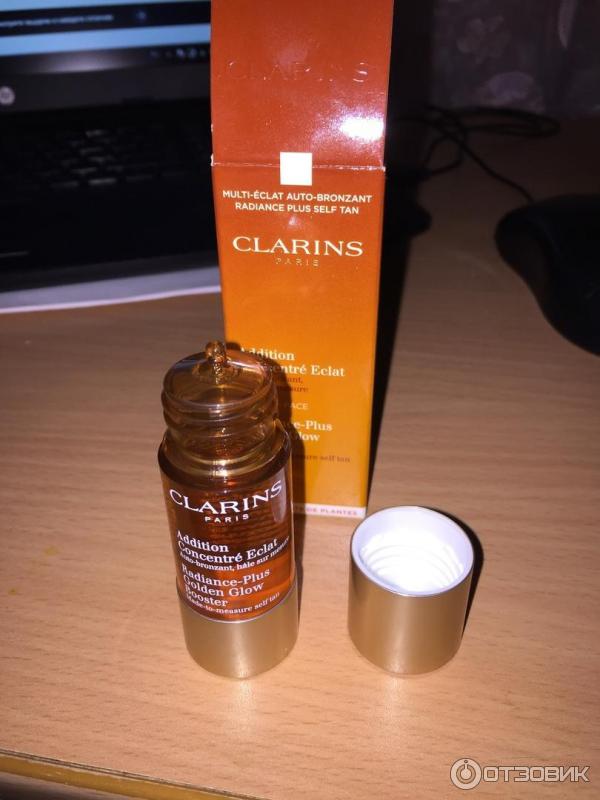 Концентрат с эффектом искусственного загара Clarins Radiance-Plus Golden Glow Booster фото