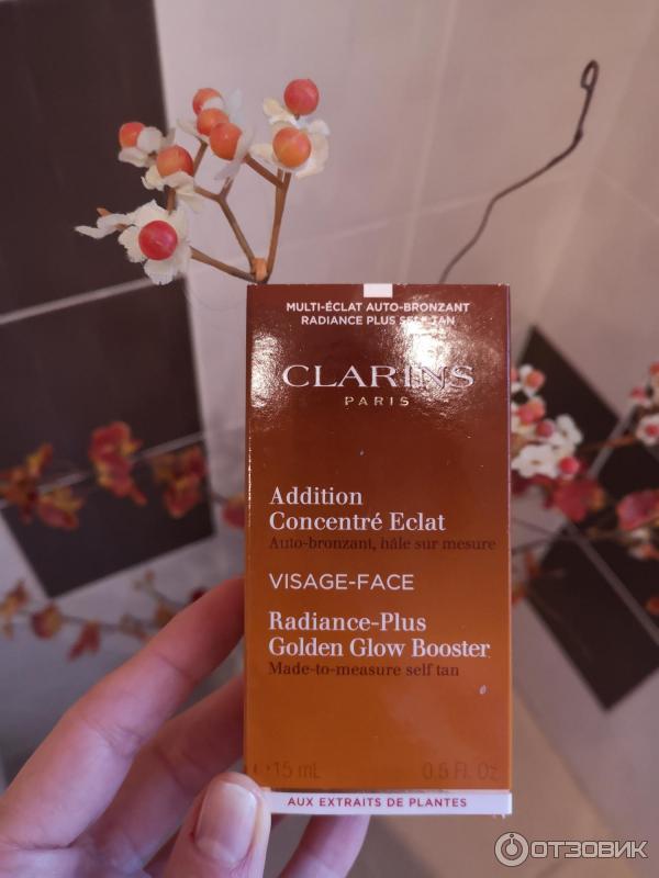 Концентрат с эффектом искусственного загара Clarins Radiance-Plus Golden Glow Booster фото