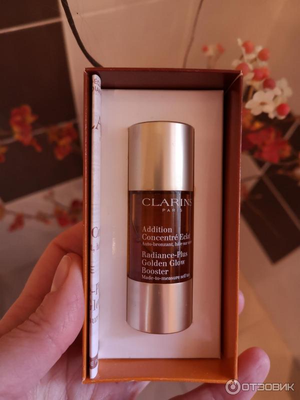 Концентрат с эффектом искусственного загара Clarins Radiance-Plus Golden Glow Booster фото