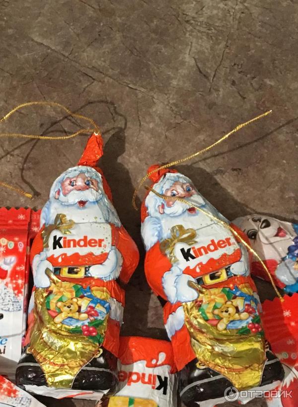 Фигурный молочный шоколад Kinder Сюрприз Дед Мороз с молочным внутренним слоем и игрушкой внутри фото