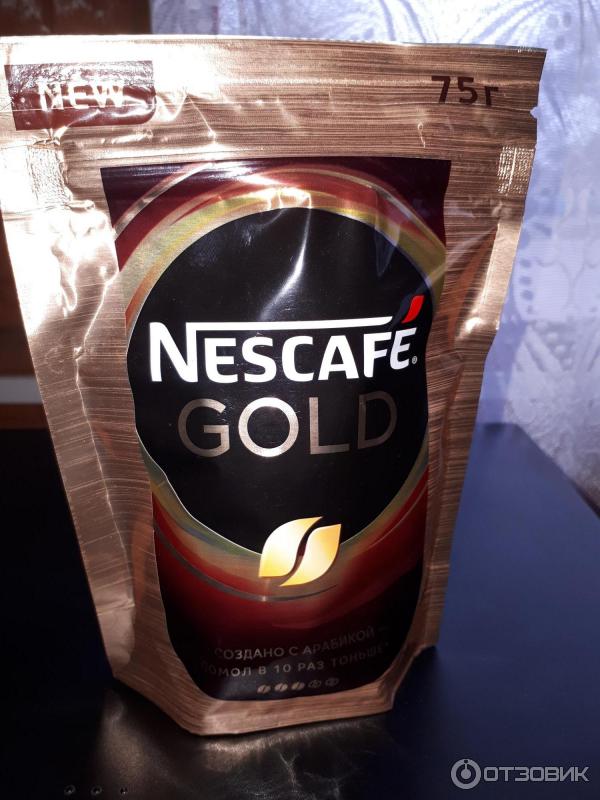 Молотый кофе в растворимом Nescafe Gold фото