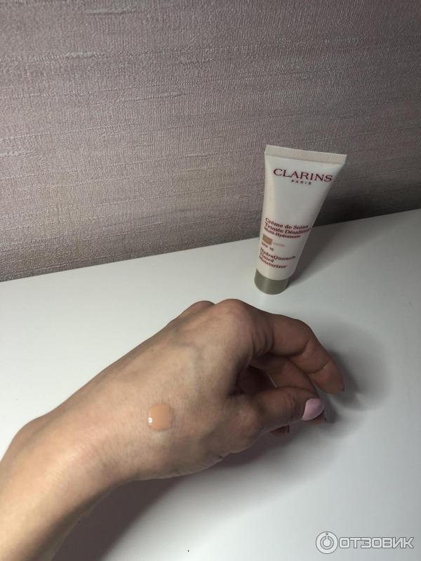 Увлажняющий крем с тоном Clarins Creme de Soins Teintee Desalterante Multi-Hydratante 00 SPF 15 фото