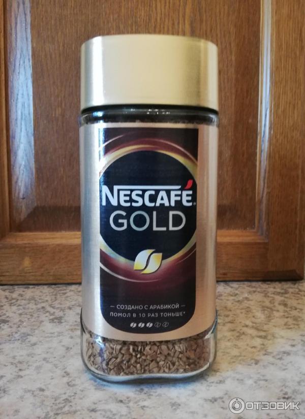 Молотый кофе в растворимом Nescafe Gold фото