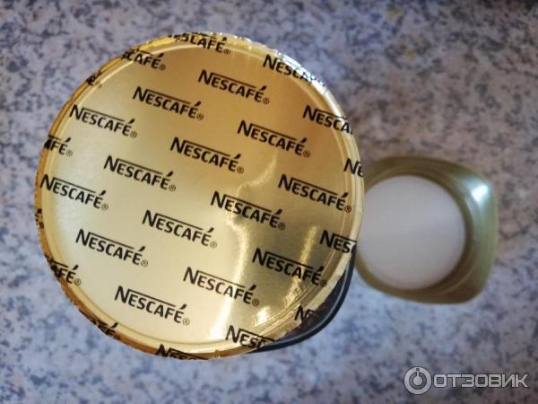 Молотый кофе в растворимом Nescafe Gold фото