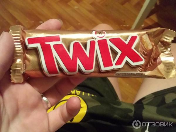 Шоколадный батончик Twix фото