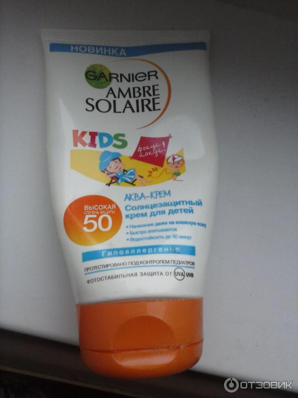 Солнцезащитный крем Garnier ambre solaire kids аква-крем SPF 50 фото