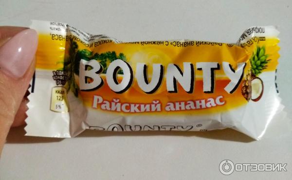 Шоколадные конфеты Bounty с нежной мякотью кокоса и соком ананаса Райский ананас фото